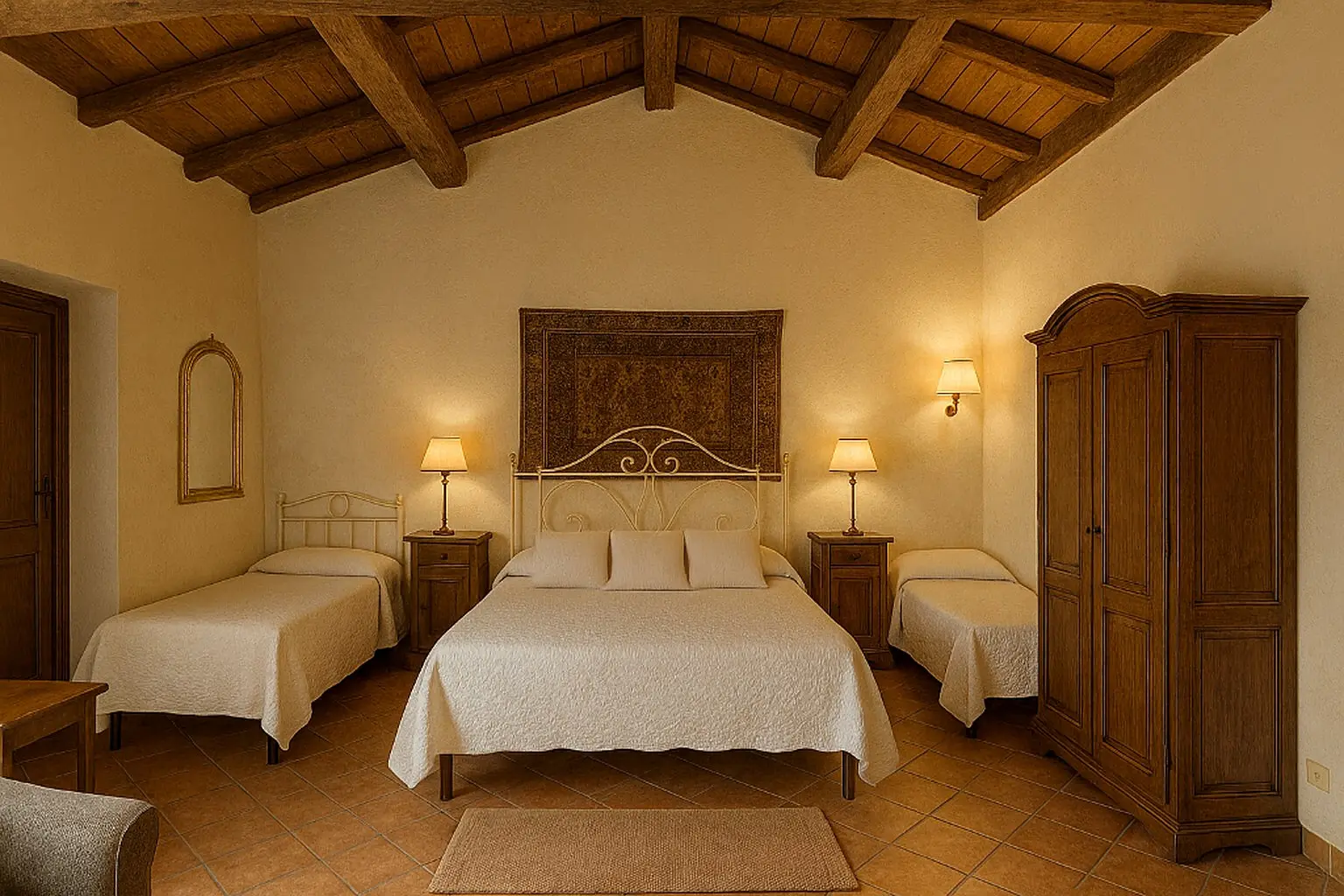 La camera della Suite Tuscania con le travi a vista e l'armadio in legno